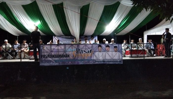 Ketua panitia Samsudin Olii saat menyampaikanlaporan panitiapembukaan pasar senggol Boltra 2026. Foto ( Jefri Rison Republish.id)